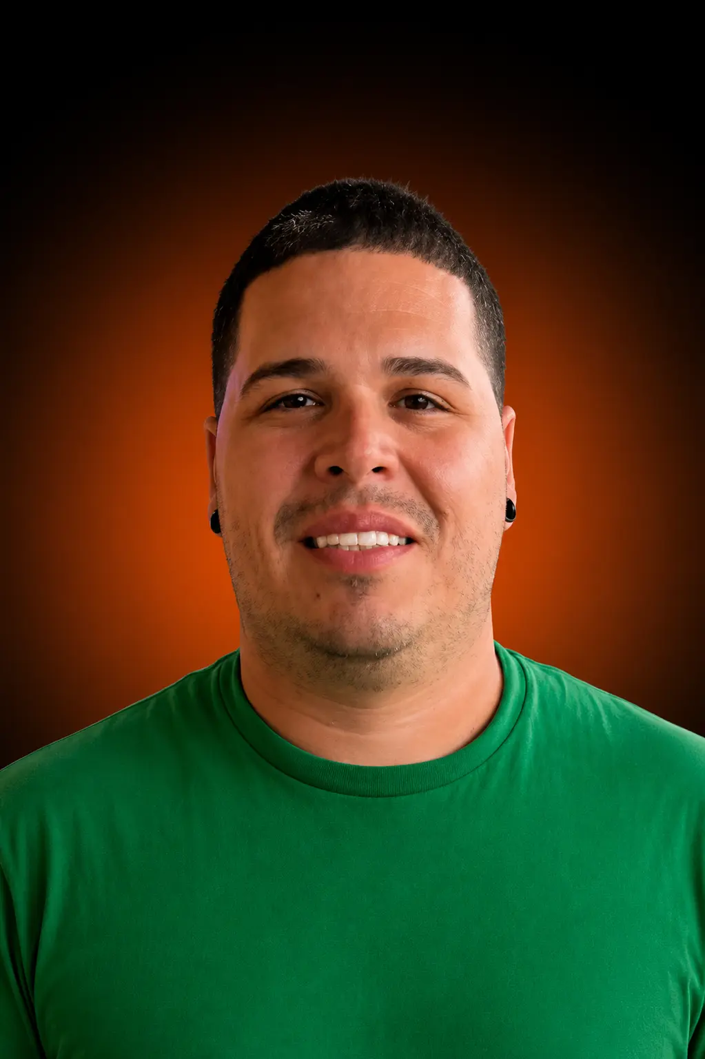 Raulph, barber at NJ's Barbershop in Casselberry FL